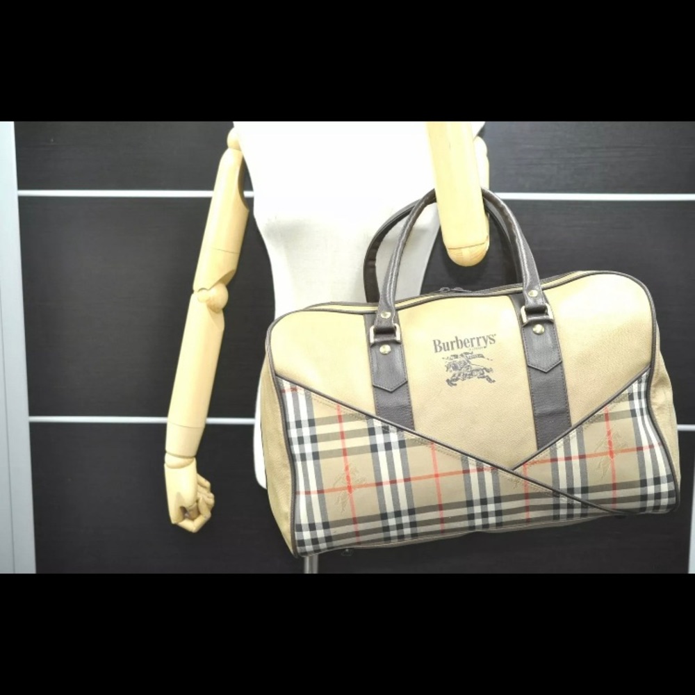 Authentic Burberry travel bag or over night bag.